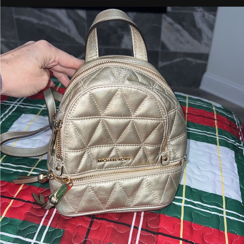 Michael Kors gold leather mini backpack